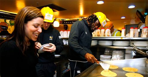 Flipping marvels: Gail, Joe Simpson and Paul Sackey slave over the hot-plate