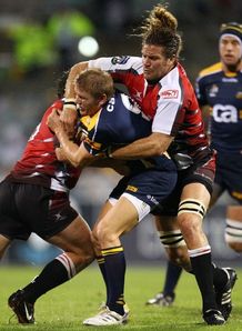 Josh Valentine held by Lions Josh Valentine held by Lions