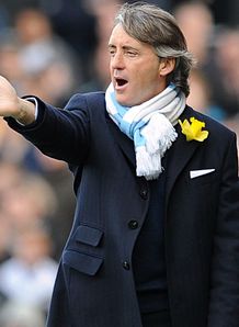 Mancini wants seven more wins