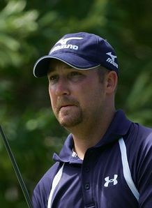 Collins edges into lead