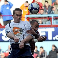 Davies: Heads home for Bolton