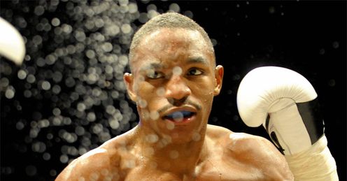 Targeted: Alexander got hit with clean shots even though he was against a light puncher