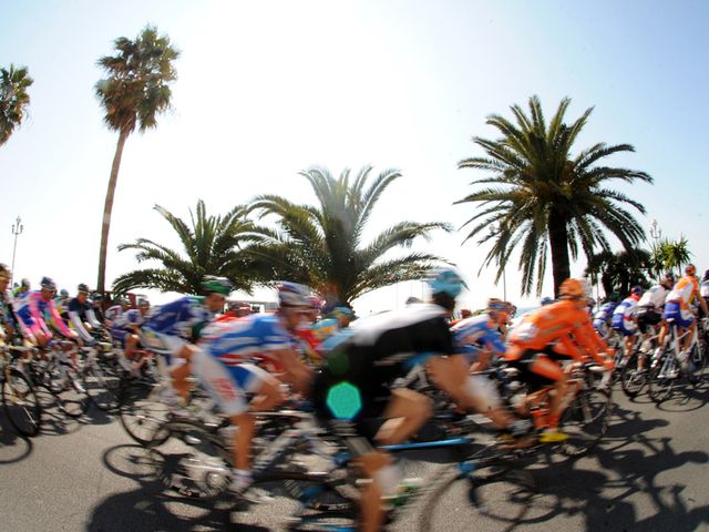 The riders are a blur as they roll out of the start gate
