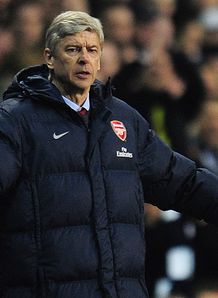 Wenger wants tighter defence