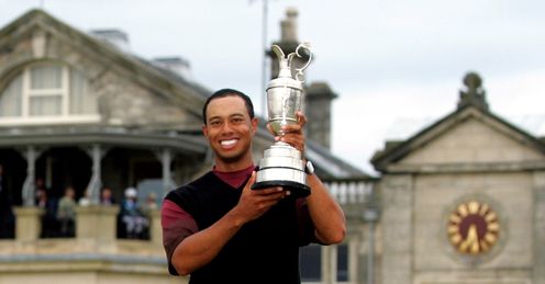 Woods holds the Claret Jug aloft at St Andrews in 2005