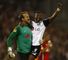 Mark Schwarzer and John Pantsil celebrate as Fulham reach the Europa League final.