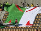 These Algeria fans show their colours before the game.