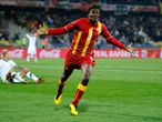 For Africa! Asamoah Gyan celebrates scoring Ghana's extra-time winning goal to the delight of a continent