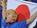 This Japan fan is in full voice before the game.