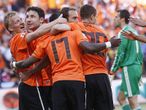 The Dutch celebrate as they seal a 2-0 victory over Denmark in the first match of Group E.