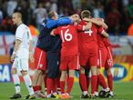 Joy and relief for England's players as they secure a last-16 spot.