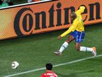 Maicon opens the scoring from the tightest of angles in Brazil's 2-1 win against North Korea