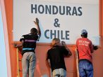 Ground staff prepare the Mbombela Stadium in Nelspruit for the first Group H clash between Honduras and Chile.