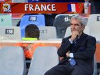 France coach Raymond Domenech alone to face the music before the kick-off.