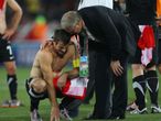 Manager Ricki Herbert consoles Ryan Nelsen, who had a terrific tournament