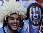These Uruguay fans are all smiles before the game.