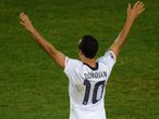 The USA golden boy salutes the crowd with a comic book finish to the game to see the Americans go through.
