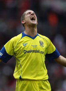 Visiting U's sneak past Walsall