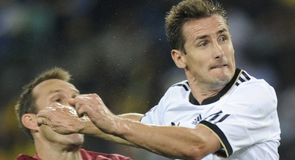 Miroslav Klose heads in Germany's second...