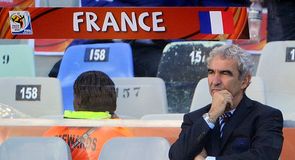 France coach Raymond Domenech alone to face the music before the kick-off.