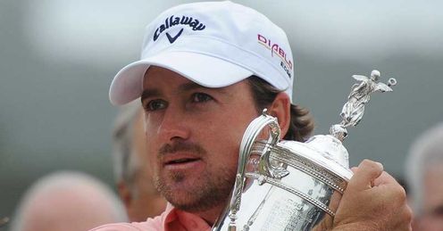 McDowell clutches the US Open trophy after his superb win at Pebble Beach