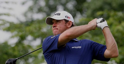 Lee Westwood charging into a first round lead Thursday with course record 63