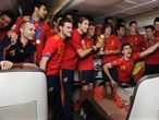 Spain celebrate on the plane as they arrive in Madrid to celebrate their World Cup success...