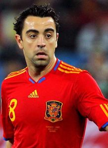 Xavi proud to reach century