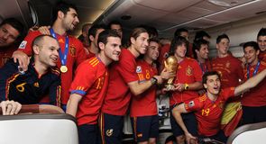 Spain celebrate on the plane as they arrive in Madrid to celebrate their World Cup success...