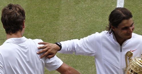 Back-hand winner: Nadal (right) commiserates with Berdych after Sunday's Wimbledon final