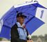 Sandy Lyle takes shelter among the early starters.