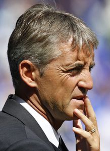 Mancini clears trio to leave