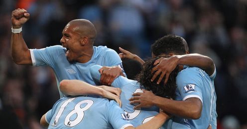 Man City celebrate after first goal v Liverpool