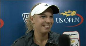Wozniacki eases through