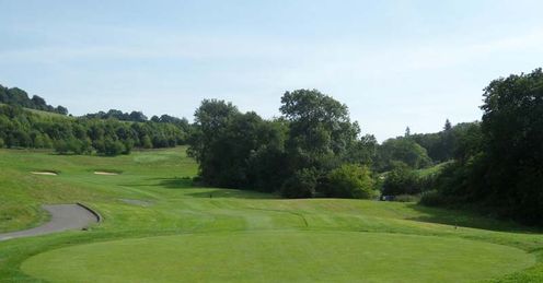 To go for the green at 15 you have to take an aggressive line over the trees.