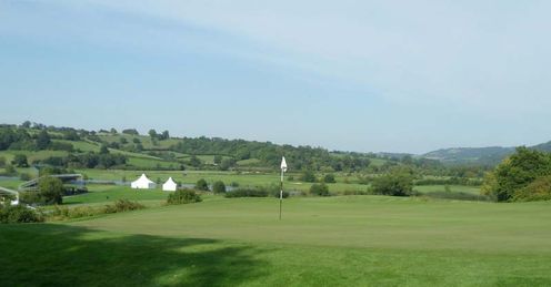 A view back across the large, sloping green at 16.