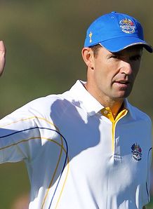 Harrington completes win