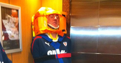Lifting spirits: John Ledger is strapped to a stretcher and stuck in an elevator!
