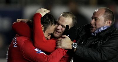 http://img.skysports.com/10/12/402x210/Dimitar-Berbatov-Wayne-Rooney_2545284.jpg