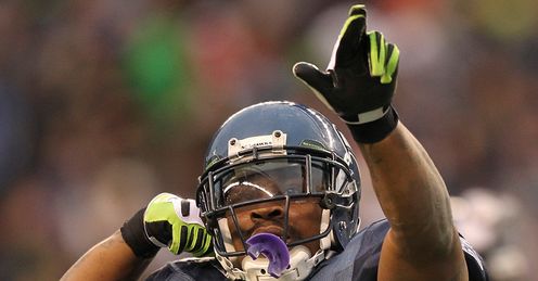 Seahawks Marshawn Lynch celeb. Hat-trick hero: Lynch scored three touchdowns 