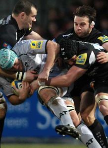 Jordan Crane Leicester tackled by three Exeter players Jordan Crane Leicester tackled by three Exeter players
