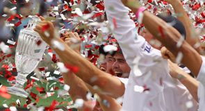 Plenty of ticker: England celebrate after sealing their first series win in Australia in 24 years Plenty of ticker: England celebrate after sealing their first series win in Australia in 24 years