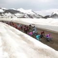 The riders climbed snow-covered peaks on the fifth day of action in Italy