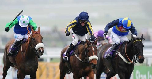 Robbie Power (centre) celebrates winning The RSA Chase on Bostons Angel at Cheltenham last March