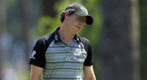 Rory McIlroy had a day to forget as his four-shot lead crumbled away.