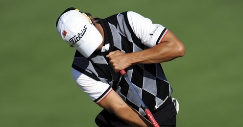 Adam Scott, one of the broomstick-wielding putters, rolling the ball home during his victory at the WGC Bridgestone Invitational