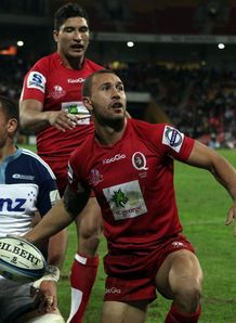 Quade Cooper celebrating try for Reds against Blues Quade Cooper celebrating try for Reds against Blues