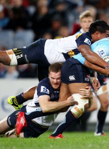 Kurtley Beale tackled in Waratahs against Brumbies Kurtley Beale tackled in Waratahs against Brumbies