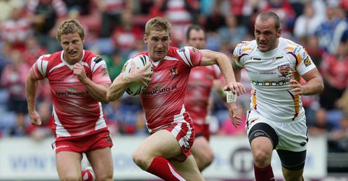 Speed merchant: Tomkins makes one of his trademark, penetrative breaks