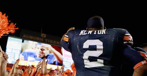 Newton: celebrates Auburn's success with crazy fans